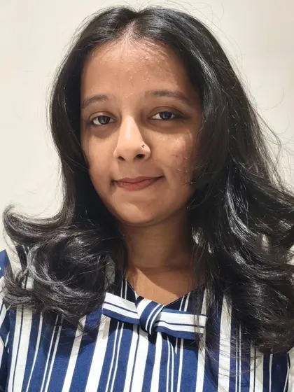 Another member of the haircut squad, showing off her new style with soft, face-framing layers.