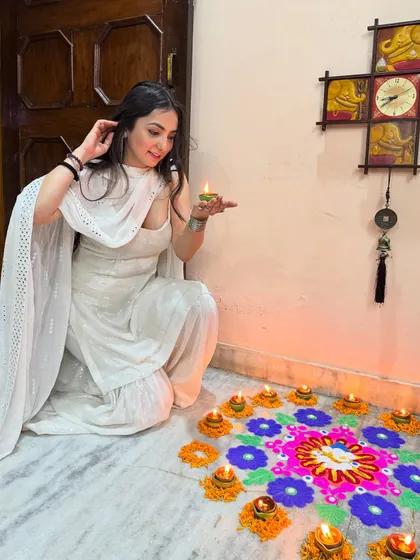 A candid smile while celebrating Diwali. My all-white ethnic outfit felt so pure and perfect for the occasion.