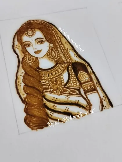 This is a close-up of a bridal figure I created with henna on paper. Learning to draw expressive faces and detailed clothing is a key part of my advanced bridal course.