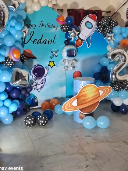 A slightly different arrangement of the space-themed birthday setup.