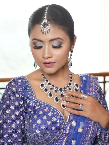 A detailed shot of the blue smokey eye makeup. I used cool-toned shimmers and a soft blend to create a dreamy, dusky look that enhances the eyes without being overpowering.