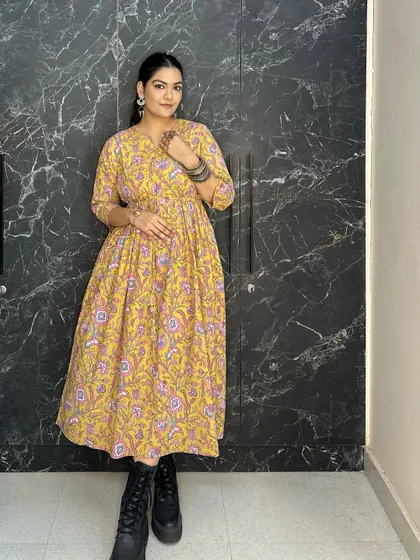 Another angle of the floral dress and combat boots. This shows how footwear can completely change the vibe of a classic ethnic dress.