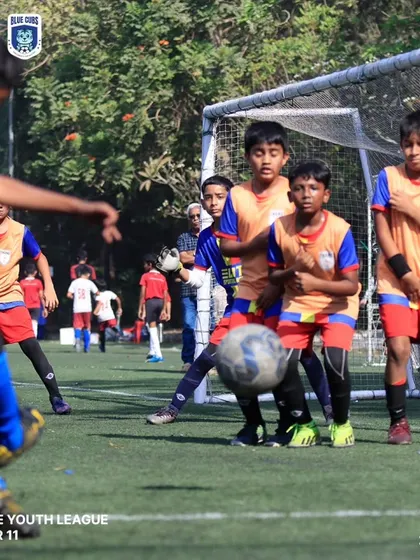 Players from our U11 team defending together during a training game in the league.