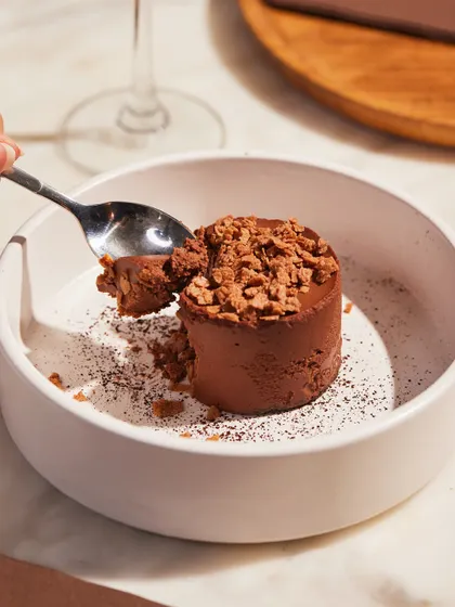 A perfect spoonful of our Bitter Choco Mousse, ready to be savoured.