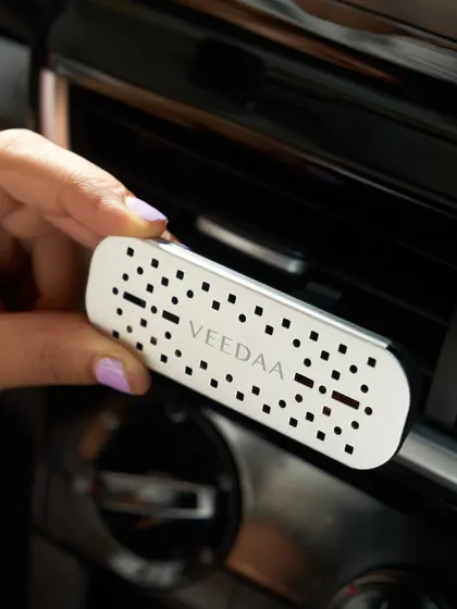 Our sleek car fragrance vent clip, designed to fit seamlessly into your car's interior. It's a small touch of metallic elegance that delivers a beautiful, consistent aroma.