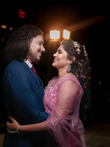 A duplicate of 84, a beautiful, softly lit candid of the couple.