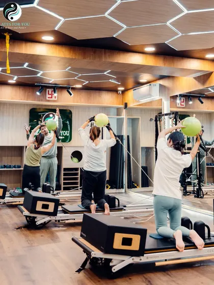 Using stability balls adds a fun and challenging element to our workouts. This group exercise focuses on shoulder mobility and core engagement, all while maintaining balance on the Reformer.
