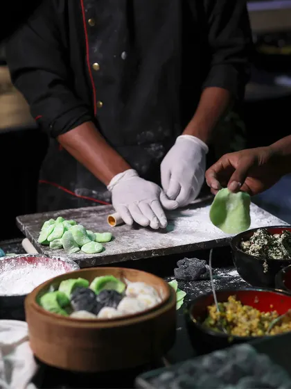 The delicate art of dim sum is a sight to behold. Our chefs meticulously fold and fill each dumpling by hand at our live stations, offering guests a taste of authentic, freshly steamed Pan-Asian cuisine.