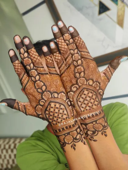 A classic Indian backhand design. This style features traditional motifs and patterns, creating a timeless and elegant look that is perfect for any wedding event.