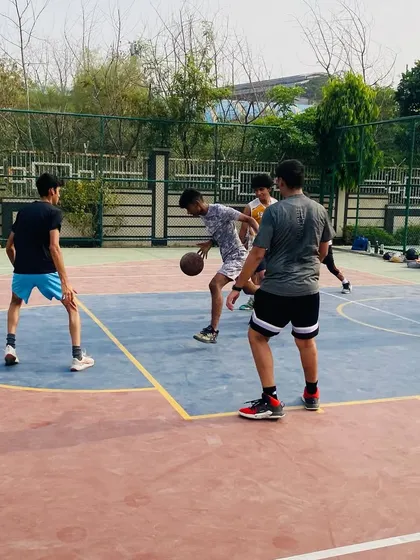 Our senior team players work on offensive plays, focusing on creating space and movement without the ball.