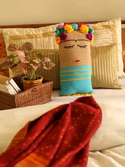 The Frida cushion on a grey day, bringing a bit of colour and life indoors. The nip in the air just makes you want to get cozy.