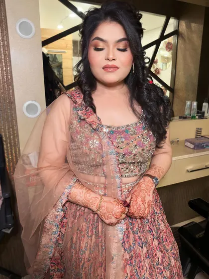 A gorgeous look for her roka ceremony. I created a soft, romantic look with a focus on her eyes and a beautiful, intricate hairstyle.