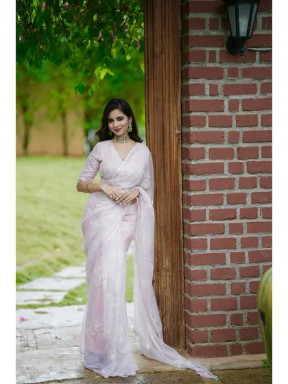 A full-length view of the blush pink saree, perfect for a romantic and sophisticated look.