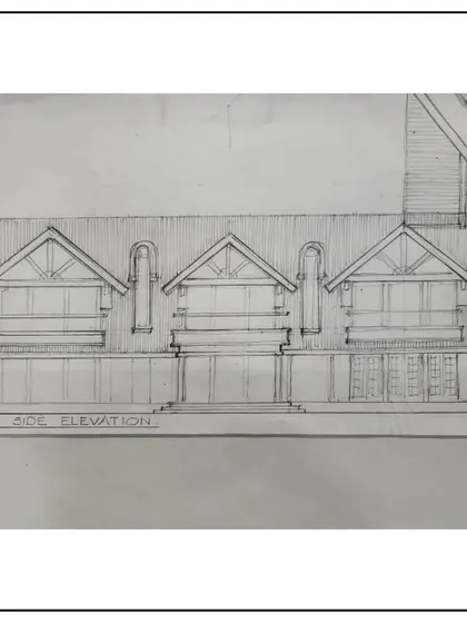 The east side elevation sketch for our European Medieval style project in Pune. This drawing shows the careful planning of the rooflines and window placements that define this historic style.