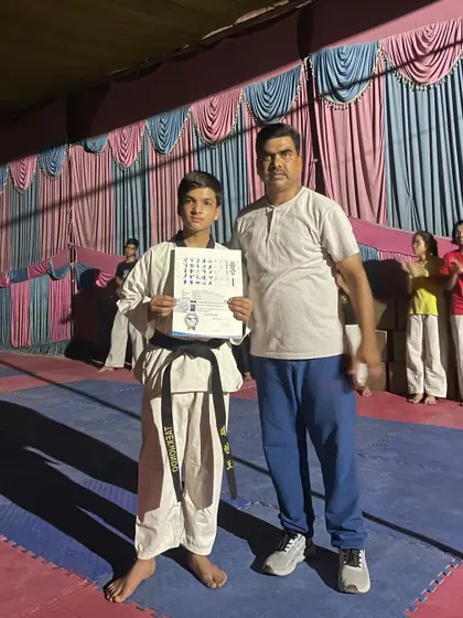 Congratulations to Yash Gupta, our new black belt holder, posing with his certificate.