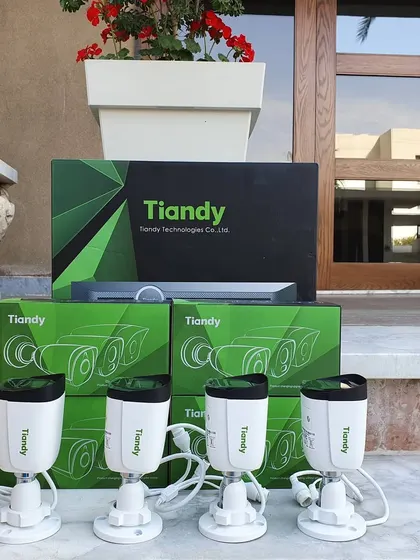A complete 4-camera kit from Tiandy, including the NVR, ready for installation. This is a great starter package for a home.