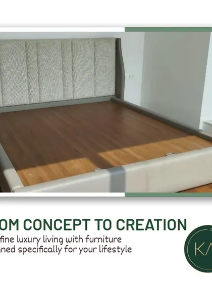 This bed features a gently curved headboard with textured upholstery, framed by a sleek, light-colored base. It's a perfect example of how we create furniture that is both modern and inviting.