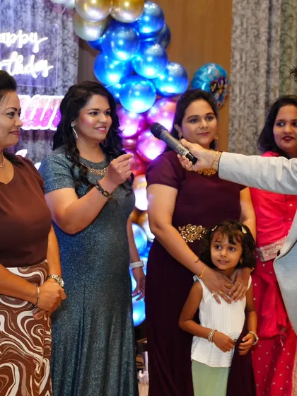 An interactive Q&A session with the ladies at a birthday party.