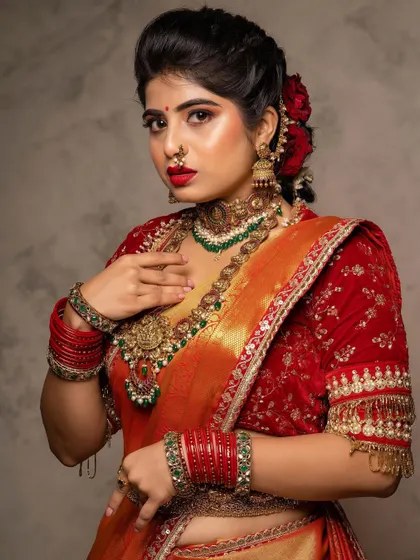Shilpa looking absolutely regal. The makeup is bold yet elegant, with a strong focus on the lips and a clean, radiant complexion that stands out.