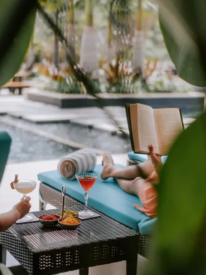 Lose yourself in a good book and the luxury of doing nothing at all. Our poolside cabanas offer a private haven for you to unwind with a refreshing cocktail and light bites, letting the day drift by peacefully.