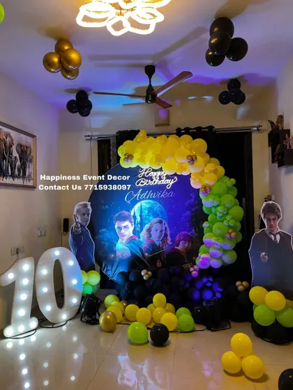A different angle of the Harry Potter themed decor, showing how the setup transforms a living room into a magical space for a birthday celebration.