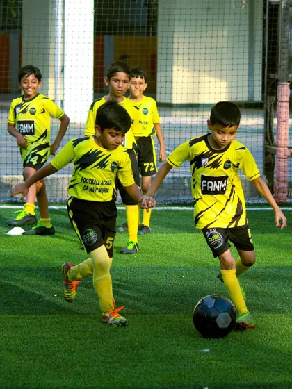 Two players challenge for the ball, showcasing the competitive energy of our training sessions.