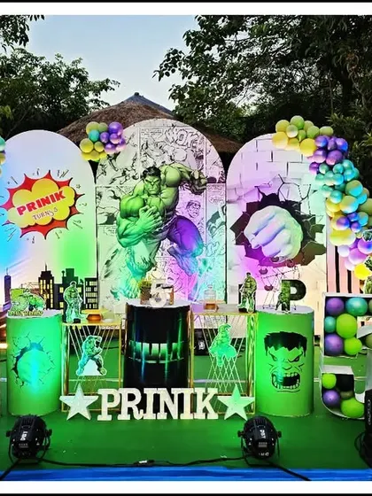 Prinik's 5th birthday was a "smash" with this incredible Hulk theme. The setup used dramatic green lighting, cracked wall effects, and multiple Hulk cutouts to create a powerful and exciting atmosphere.