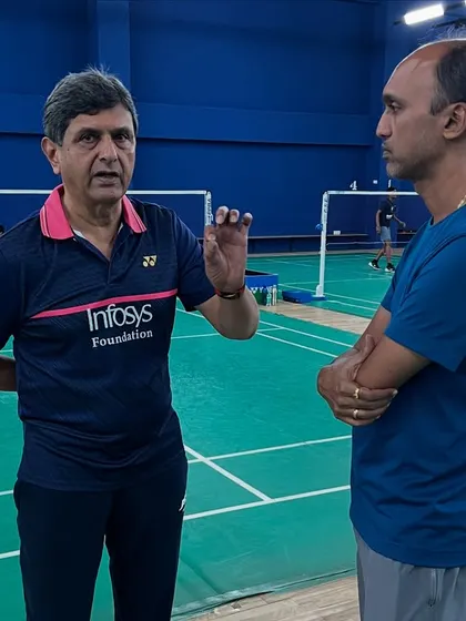 Prakash sir in discussion with a senior coach during a games day. This collaborative approach ensures our coaching philosophy is consistently applied across all levels.