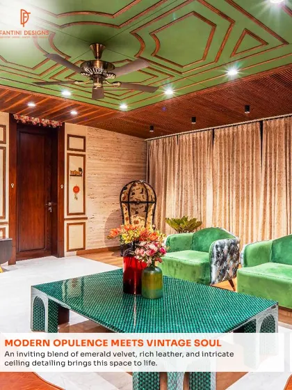 Another view of this vintage-inspired living room, focusing on the emerald green velvet sofas and the intricate ceiling design. It’s a space that blends modern opulence with a soulful, classic charm.