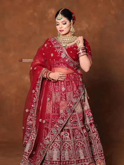 The full-length view shows how the complete look comes together. The makeup perfectly complements the intricate embroidery and heavy jewelry, creating a cohesive royal aesthetic.