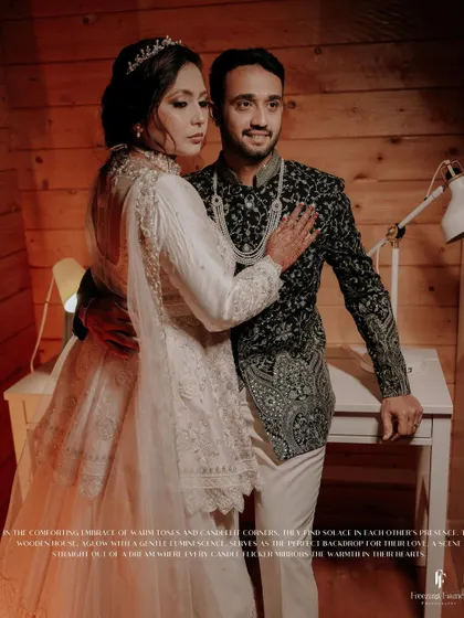 A full-length portrait of the couple in a cozy, wood-paneled room, with a caption describing the warm and intimate scene.