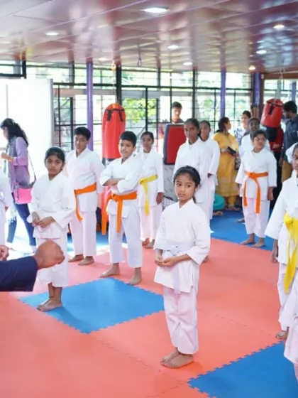 Instructing my young students during the Interdojo Championship. It is crucial to provide guidance and motivation right up to the moment they compete.