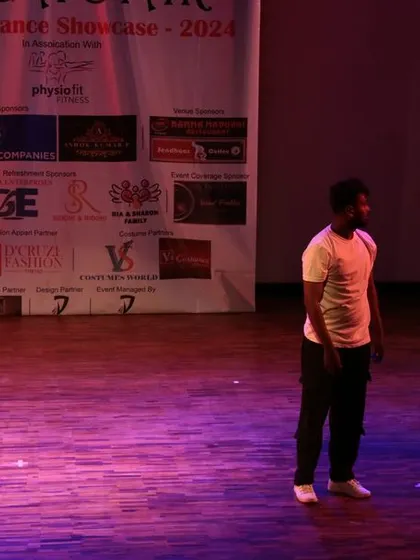 A theatrical moment from one of our dance pieces, combining acting with movement to tell a story.