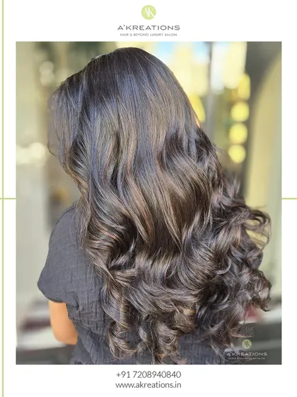 A back view of the caramel brown highlights, showcasing the full volume and dimension of the style.