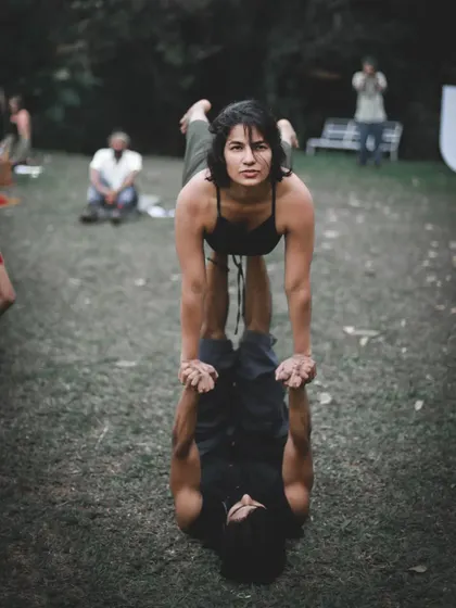 Flying with an amazing Poi master at a yoga festival. Acro yoga brings together people with different movement backgrounds.