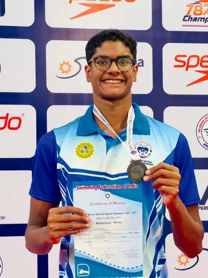 Akash Mani with his bronze from the 50m Freestyle.