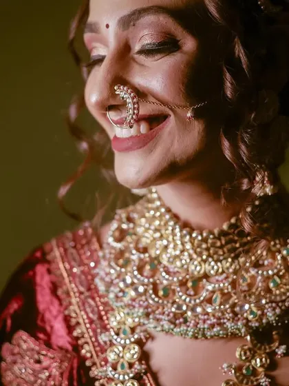 A close-up of the bride's joyful laugh. These are the candid, happy moments that we love to capture.
