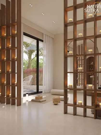We designed this in-home spa room as a sanctuary of stillness. Wooden screens with candle niches create a warm, intimate glow, while the minimalist setup is perfect for yoga, meditation, or simply unwinding.