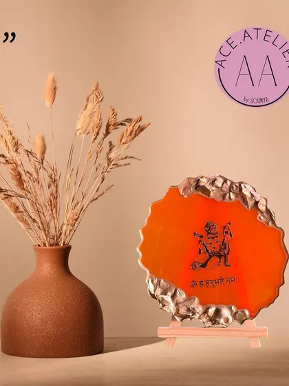A 5-inch Hanumanji frame, perfect for your car dashboard or personal altar. The bright orange color is symbolic and full of energy.