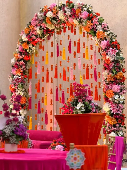 The floral arch in all its glory, a perfect backdrop for the bride during her Mehendi ceremony.