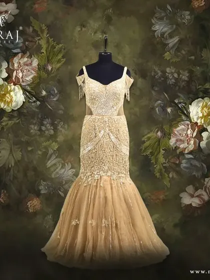 A full view of the gilded gold mermaid gown, perfect for the fashion icon.