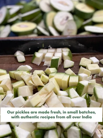 Our pickles are made fresh, in small batches, using authentic recipes. This includes traditional techniques like hand-cutting the mangoes, which ensures the perfect texture and bite.