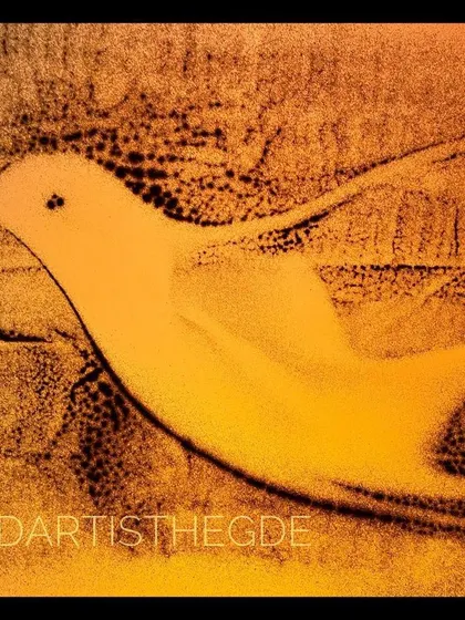 This version of the 'Flying High' bird is rendered in a slightly different hue, showing how subtle changes in light and sand can alter the mood of the artwork.