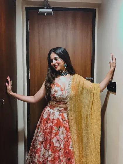 A full-length view of the floral lehenga, perfect for a sangeet or reception.