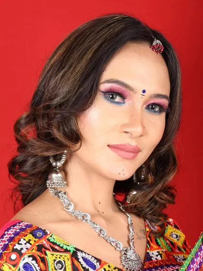A detailed shot of the colorful eye makeup for this Navratri look. I used a mix of pink and blue to create a unique and festive style.