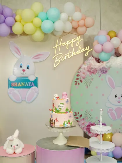 A beautiful photo from a client's garden-themed party, with our two-tier bunny cake as the centerpiece. We love seeing how our cakes fit into your celebrations.