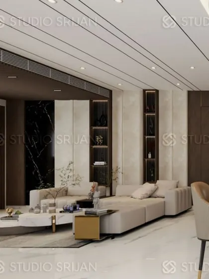 The living area of the Krishna Park project, showcasing a sophisticated palette of neutrals, dark wood, and black marble for a contemporary and luxurious feel.