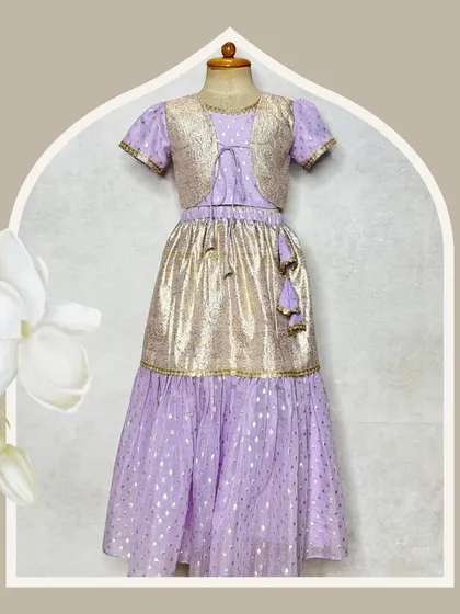 A beautifully styled shot of the lavender and gold lehenga set, perfect for Diwali or a family wedding.