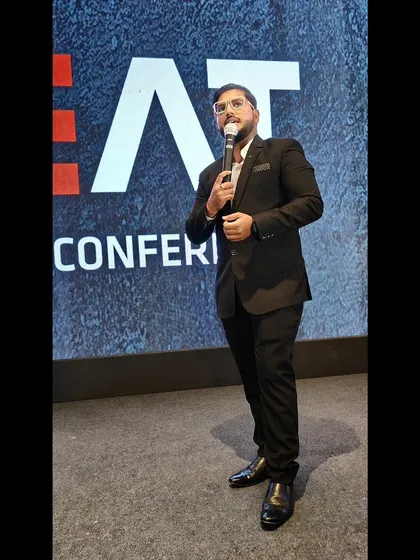 On stage at a conference, breaking down complex topics and keeping the audience engaged. My goal is to make every presentation feel like an opportunity, not a difficulty.
