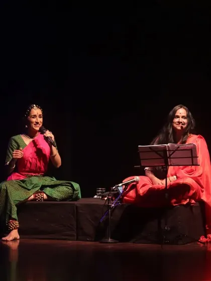 A seated interaction during 'Mandala'. We often converse and interact during the performance, making it a fluid and organic experience for us and the audience.